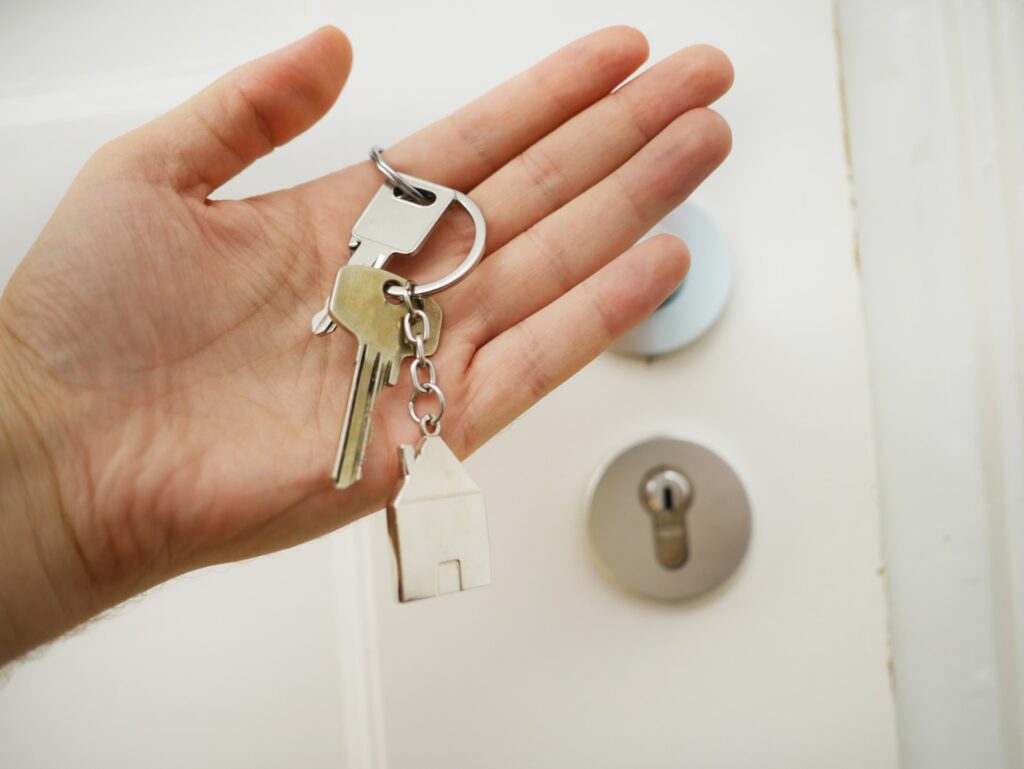 Locksmith rekeying a residential door lock with precision